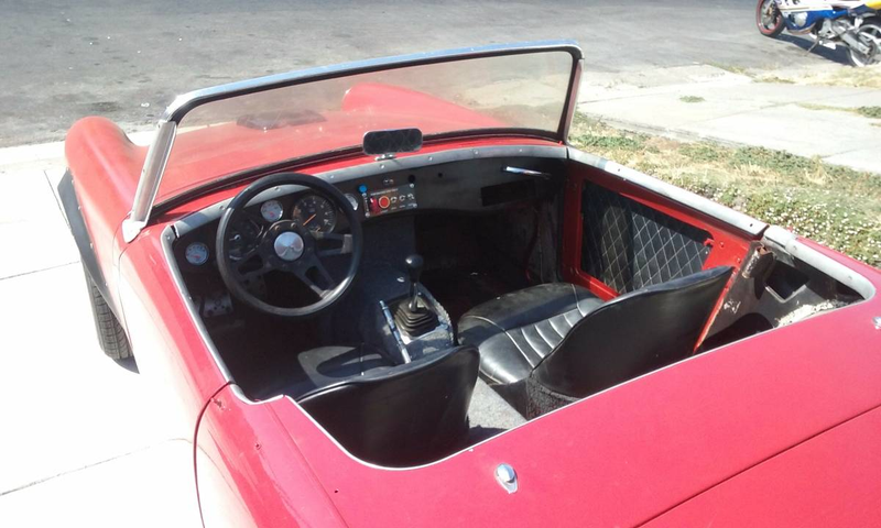 Illustration for article titled For $5,900, Would You Get Down With This Rotary 1962 MG Midget?